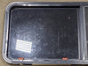 Used Black Radius Emergency Opening Window : 47 1/4" W x 22 1/2" H x 1 3/4" D - Young Farts RV Parts