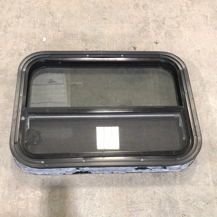 Used Black Radius Opening Window : 23 1/2" W x 17 1/2" H x 2" D