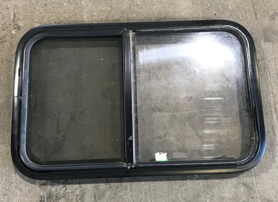 Used Black Radius Opening Window : 29 1/2" W x 17 1/2" H x 2"