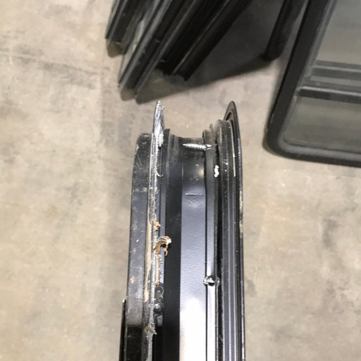 USED Black Radius Opening Window : 47 1/4" W x 23" H x 2" D - Young Farts RV Parts