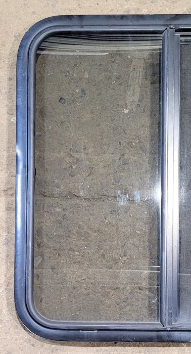 Used Black Radius Opening Window : 29 1/4" W x 27 1/4" H x 1 1/4" D - Young Farts RV Parts