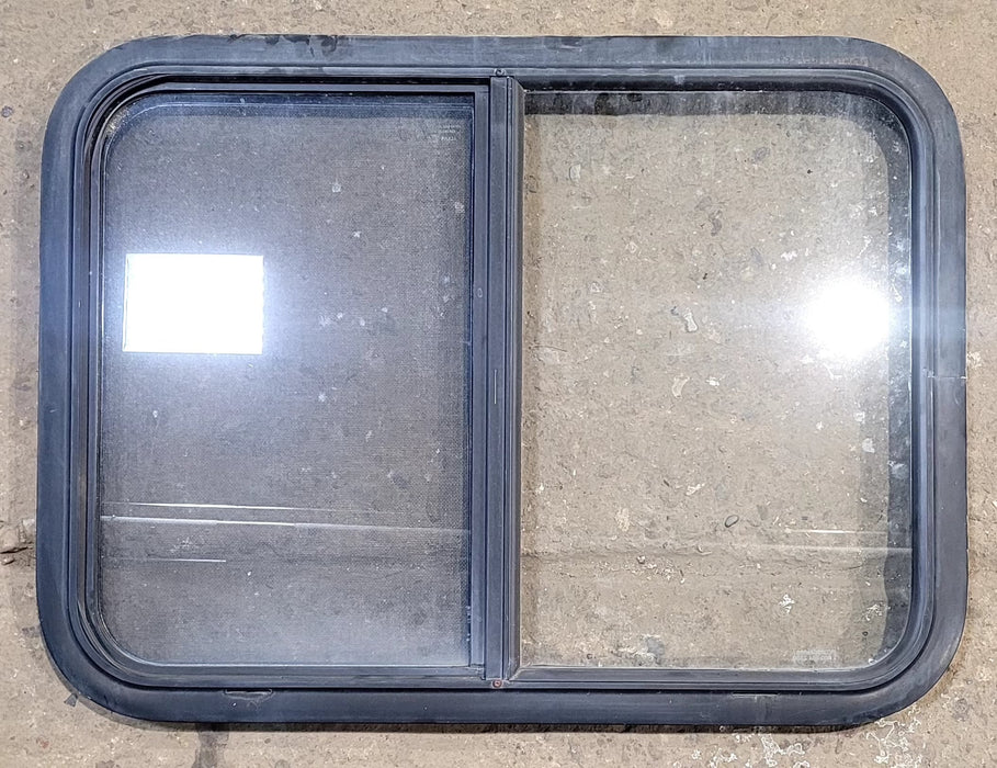 Used Black Radius Opening Window : 29 1/4" W x 21 1/4" H x 1 1/4" D - Young Farts RV Parts