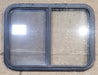 Used Black Radius Opening Window : 29 1/4" W x 21 1/4" H x 1 1/4" D - Young Farts RV Parts