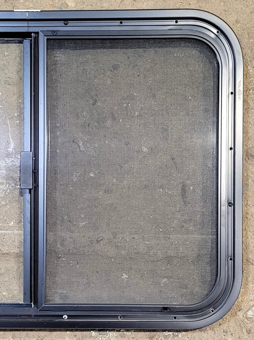 Used Black Radius Opening Window : 29 1/4" W x 21 1/4" H x 1 1/4" D - Young Farts RV Parts