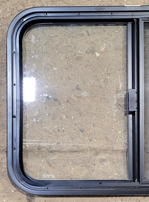Used Black Radius Opening Window : 29 1/4" W x 21 1/4" H x 1 1/4" D - Young Farts RV Parts