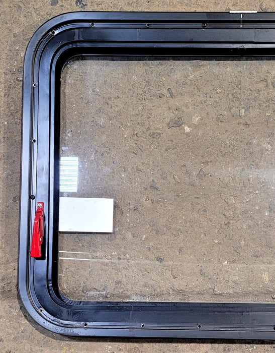 Used Black Radius Emergency Opening Window : 29 1/2" W x 21 1/2" H x 1 1/8" D - Young Farts RV Parts