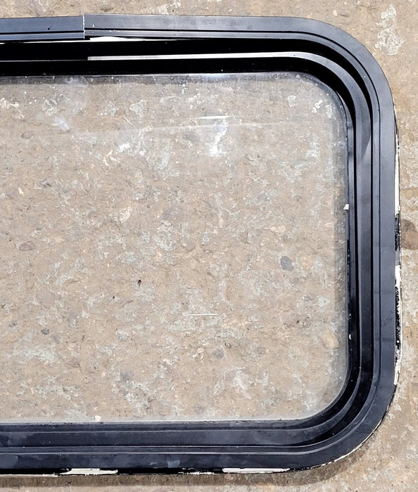 Used Black Radius Non Opening Window : 25" W x 16 3/4" H x 1 5/8" D - Young Farts RV Parts