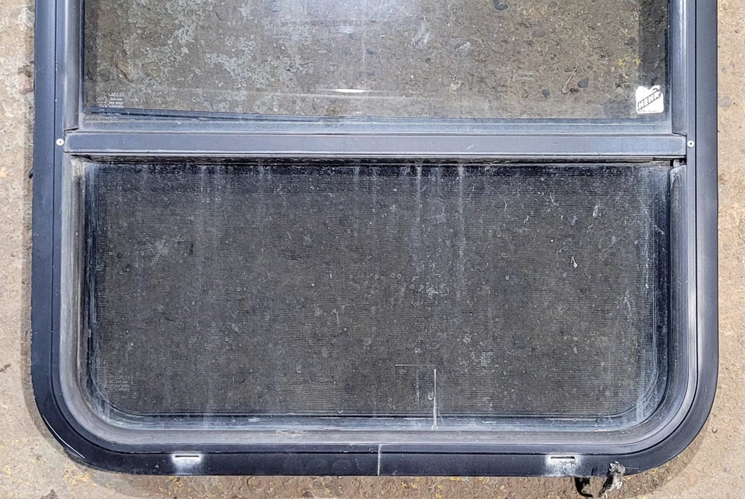 Used Black Radius Opening Window : 34 1/2" W x 23 1/2" H x 1 7/8" D - Young Farts RV Parts