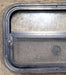 Used Black Radius Opening Window : 23 1/2" W x 14 1/2" H x 1 3/4" D - Young Farts RV Parts