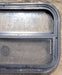 Used Black Radius Opening Window : 23 1/2" W x 14 1/2" H x 1 3/4" D - Young Farts RV Parts