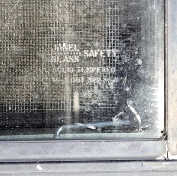 Used Black Radius Opening Window : 29 1/4" W x 21 1/4" H x 2" D - Young Farts RV Parts