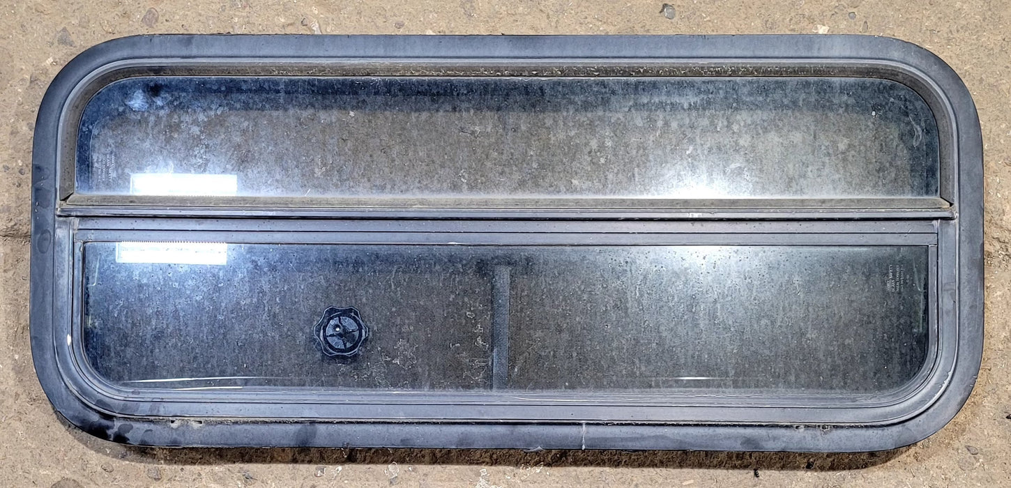 Used Black Radius Opening Window : 35 1/4" W x 14 1/4" H x 2" D - Young Farts RV Parts