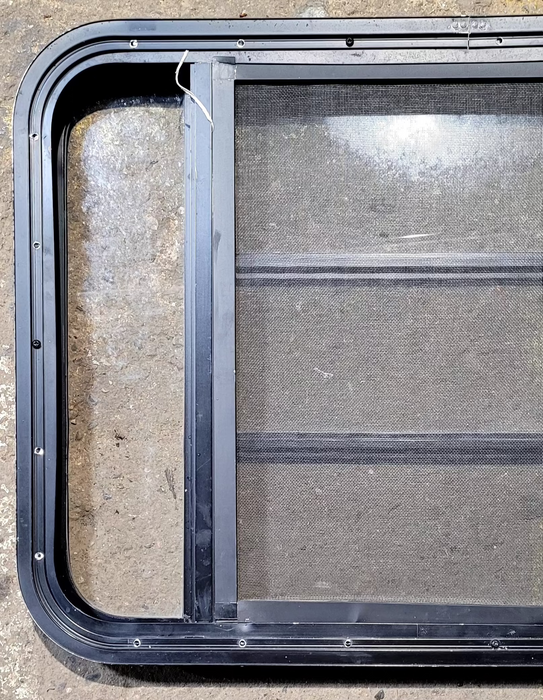 Used Black Radius Opening Window : 29 1/4" W x 22 1/4" H x 1 3/4" - Young Farts RV Parts