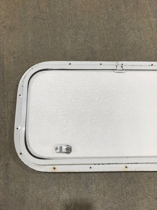Used Radius Cargo / compartment Door 23 1/2" W x 11 1/2" H - Young Farts RV Parts