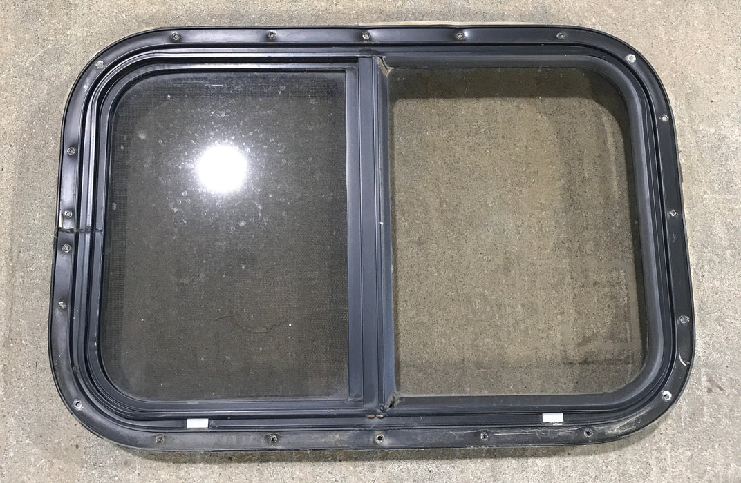 Used Black Radius Opening Window : 24 1/2" W x 19 1/4" H x 1 1/4"