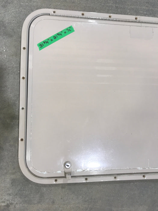 Used Radius Cornered Cargo Door  31 3/4" W  x 21 3/4" H x  1/2" D