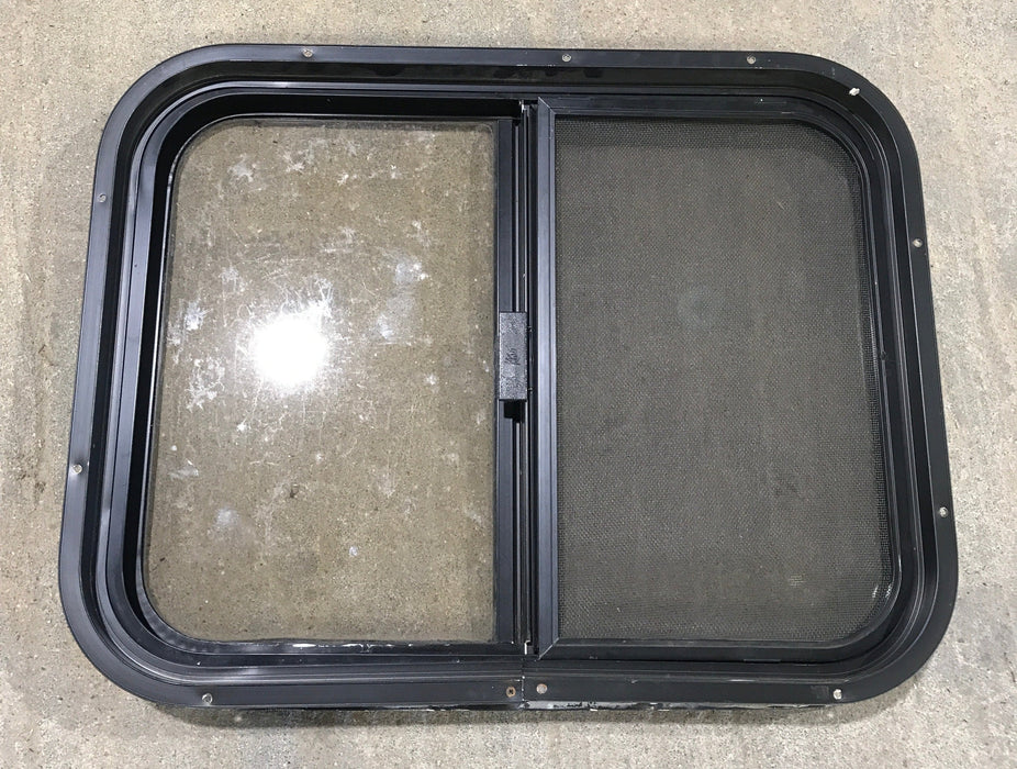 Used Black Radius Opening Window : 24 1/2" W x 19 1/4" H x 1 1/4"