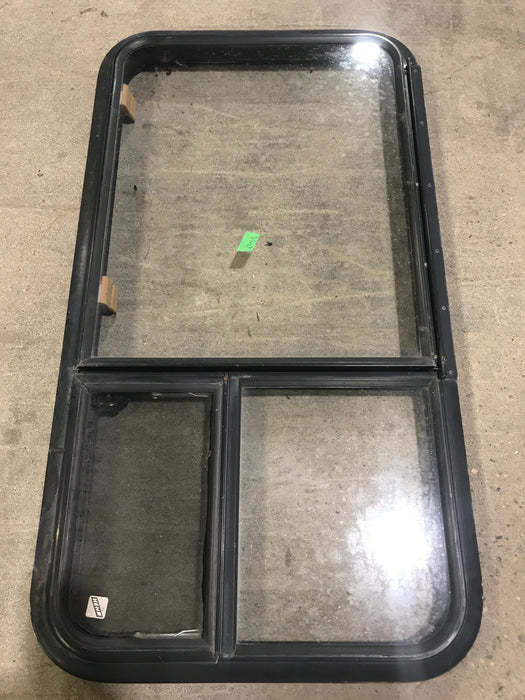 Used Black Radius Emergency Opening Window : 41 1/2" W X 21 1/2" H X 2" D - Young Farts RV Parts