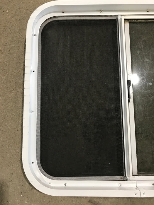 Used White Radius Opening Window : 24 1/4" W x 21 1/2" H x 2" D