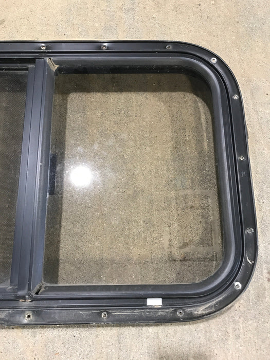 Used Black Radius Opening Window : 24 1/2" W x 19 1/4" H x 1 1/4"
