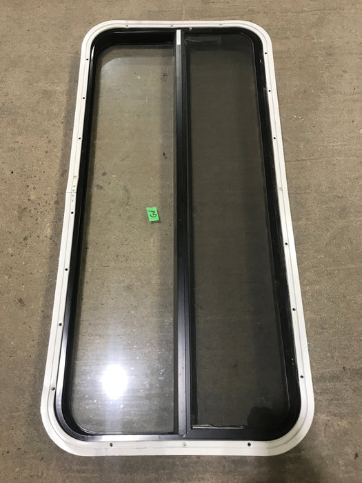 Used Black Radius Opening Window : 41 1/2" W x 19 1/2" H x 2" D - Young Farts RV Parts
