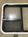 Used Black Radius Emergency Opening Window : 41 1/2" W X 21 1/2" H X 2" D - Young Farts RV Parts