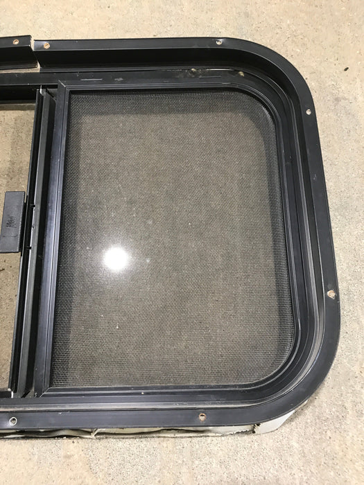 Used Black Radius Opening Window : 24 1/2" W x 19 1/4" H x 1 1/4"