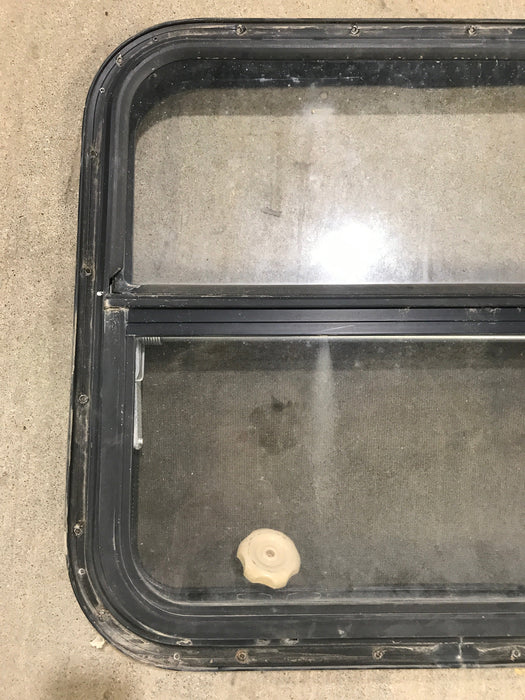 Used Black Radius Opening Window : 24 1/2" W x 22 1/2" H x 2" D