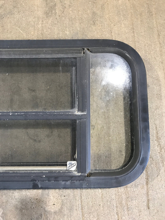 Used Black Radius Opening Window : 29 1/2" W x 14 3/4" H x 2"