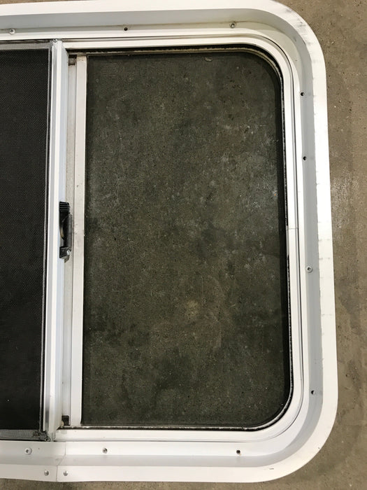 Used White Radius Opening Window : 24 1/4" W x 21 1/2" H x 2" D