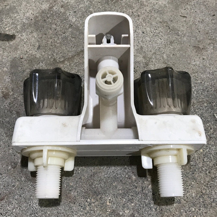 Used 4" Bathroom Faucet Bone With Smoked Knobs - Young Farts RV Parts