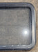 Used Black Radius Emergency Opening Window : 29 1/2" W x 21 1/2" H x 1 1/2" - Young Farts RV Parts