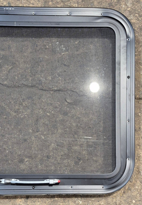 Used Black Radius Emergency Opening Window : 29 1/2" W x 21 1/2" H x 1 1/2" - Young Farts RV Parts