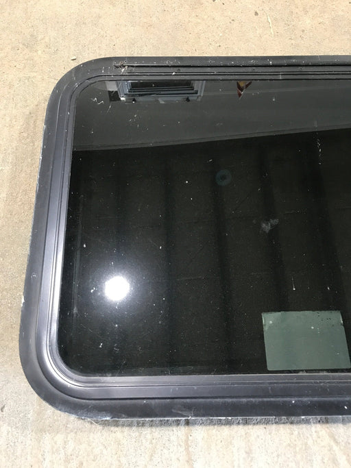 Used Black Radius Emergency Opening Window : 29 1/2" W x 21 1/2" H x 1 7/8" - Young Farts RV Parts