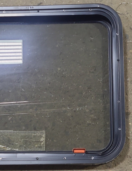 Used Black Radius Emergency Opening Window : 29 3/8" W x 22 1/2" H x 1 7/8" D