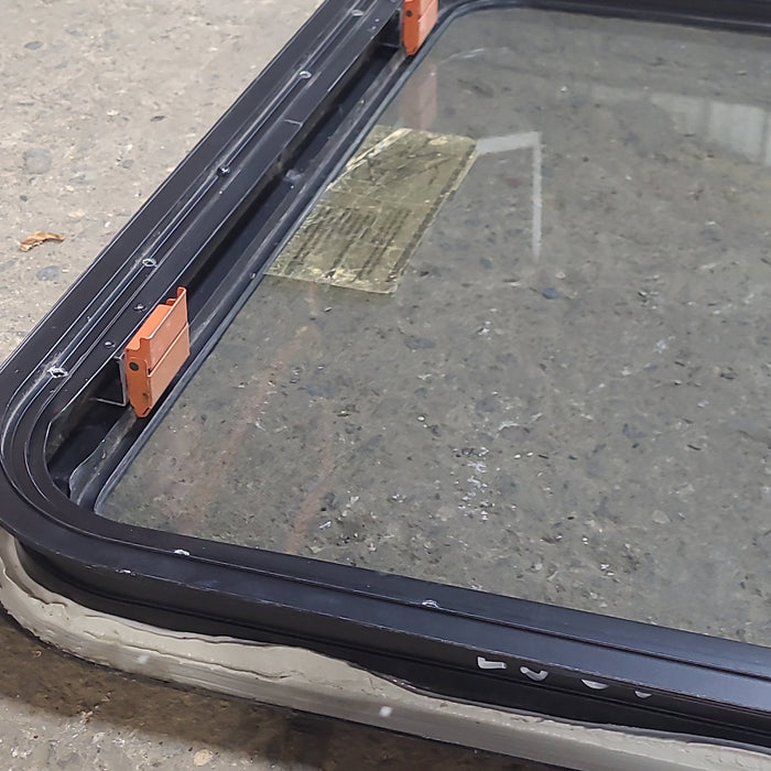 Used Black Radius Emergency Opening Window : 29 3/8" W x 22 1/2" H x 1 7/8" D