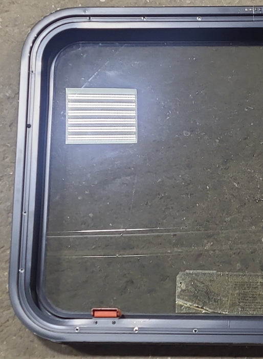 Used Black Radius Emergency Opening Window : 29 3/8" W x 22 1/2" H x 1 7/8" D