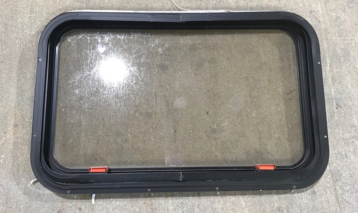 Used Black Radius Emergency Opening Window : 30 1/2" W x 19 1/4" H x 1 1/4" - Young Farts RV Parts
