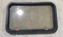 Used Black Radius Emergency Opening Window : 30 1/2" W x 19 1/4" H x 1 1/4" - Young Farts RV Parts