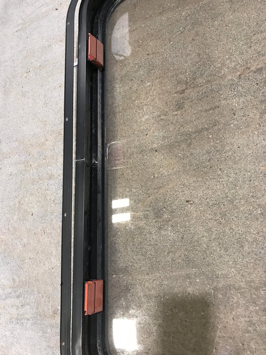 Used Black Radius Emergency Opening Window : 30 1/2" W x 19 1/4" H x 1 1/4" - Young Farts RV Parts