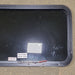 Used Black Radius Emergency Opening Window : 35 1/2" W x 21 1/2" H x 1 1/4" D - Young Farts RV Parts
