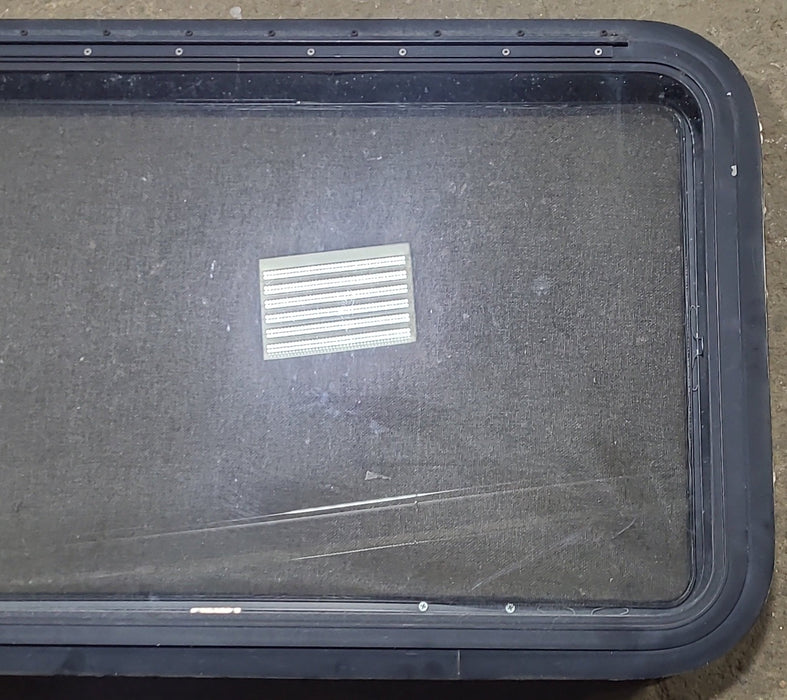 Used Black Radius Emergency Opening Window : 35 3/8" W x 21 3/8" H x 1 5/8" D - Young Farts RV Parts