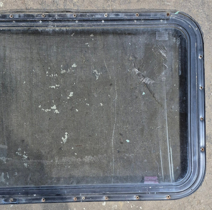 Used Black Radius Emergency Opening Window : 36 3/4 x 23 1/2 x 1 1/2" D - Young Farts RV Parts