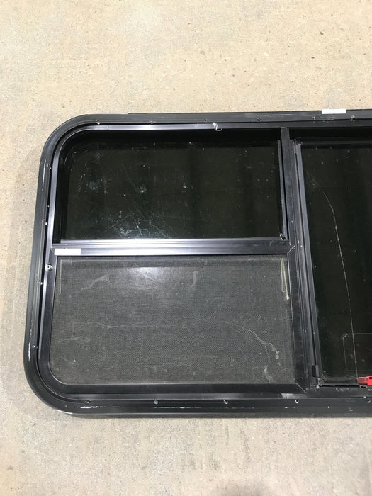 Used Black Radius Emergency Opening Window : 41 1/2" W x 21 1/2" H x 1 7/8" - Young Farts RV Parts