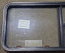 Used Black Radius Emergency Opening Window : 47 1/2" W x 21 1/4" H x 1 7/8" D - Young Farts RV Parts
