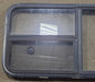 Used Black Radius Emergency Opening Window : 47 1/2" W x 21 1/4" H x 1 7/8" D - Young Farts RV Parts