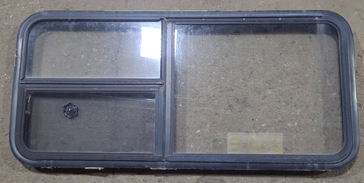 Used Black Radius Emergency Opening Window : 47 1/2" W x 21 1/4" H x 1 7/8" D - Young Farts RV Parts