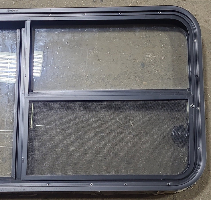 Used Black Radius Emergency Opening Window : 47 1/2" W x 21 1/4" H x 1 7/8" D - Young Farts RV Parts