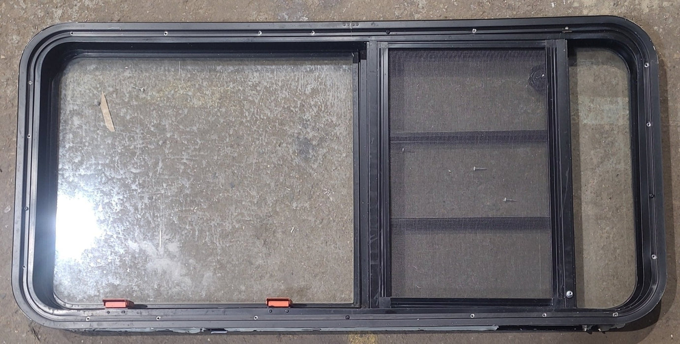 Used Black Radius Emergency Opening Window : 47 1/2" W x 22 1/4" H x 1 7/8" D - Young Farts RV Parts