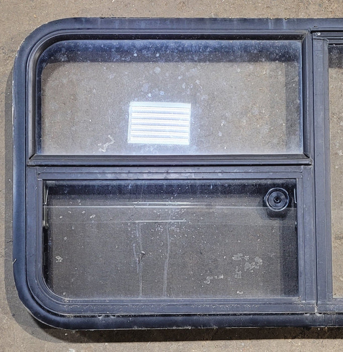 Used Black Radius Emergency Opening Window : 47 1/4" W x 21 1/4" H x 1 7/8" - Young Farts RV Parts